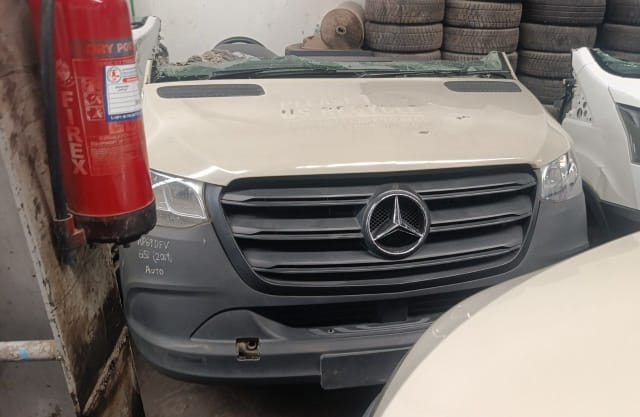 White Mercedes-Benz Sprinter front halfcut — hood, grille and headlights, Sharjah market
