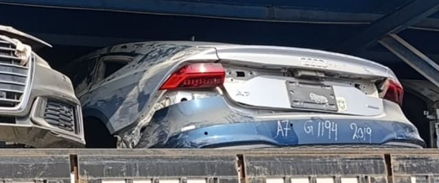 Silver Audi A7 Sportback rear halfcut: tailgate, tail lights and rear bumper, Sharjah market
