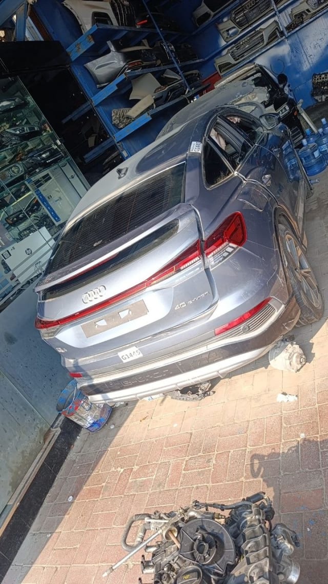 Grey-blue Audi Q4 e-tron for parts — tailgate, LED taillights and rear bumper, Sharjah market