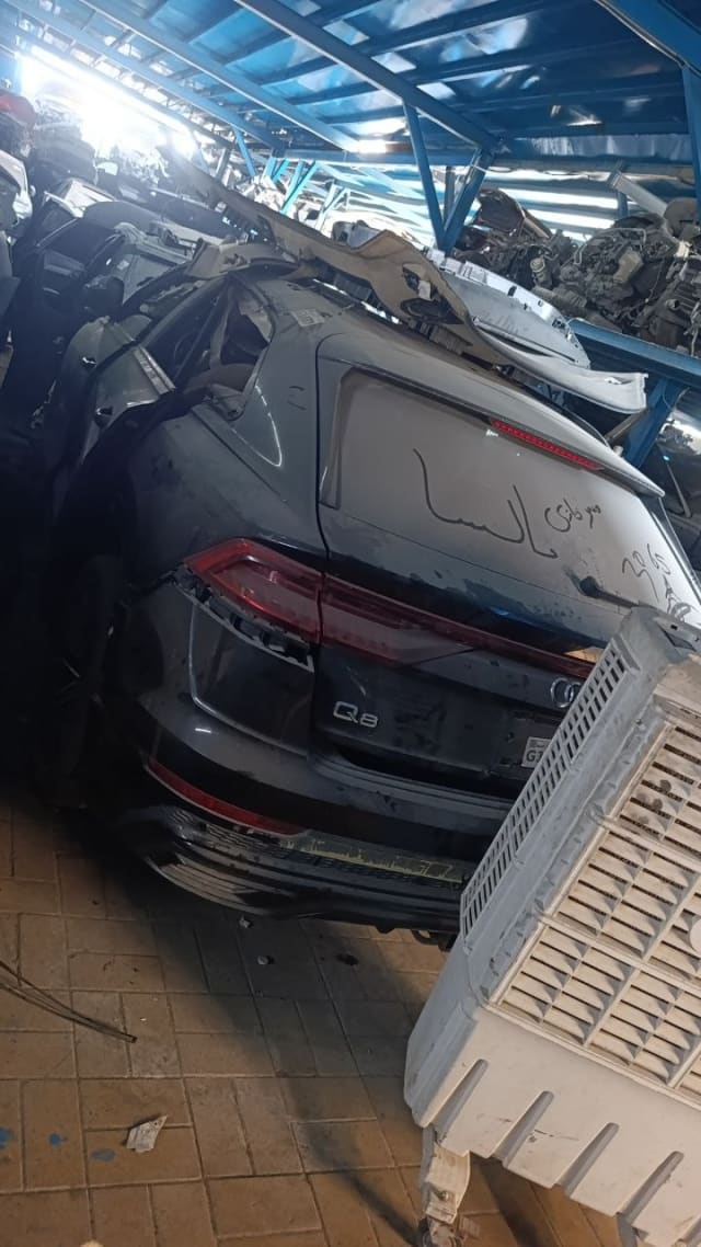 Dark grey Audi Q8 rear halfcut — tailgate, LED tail lights and rear bumper, Sharjah market