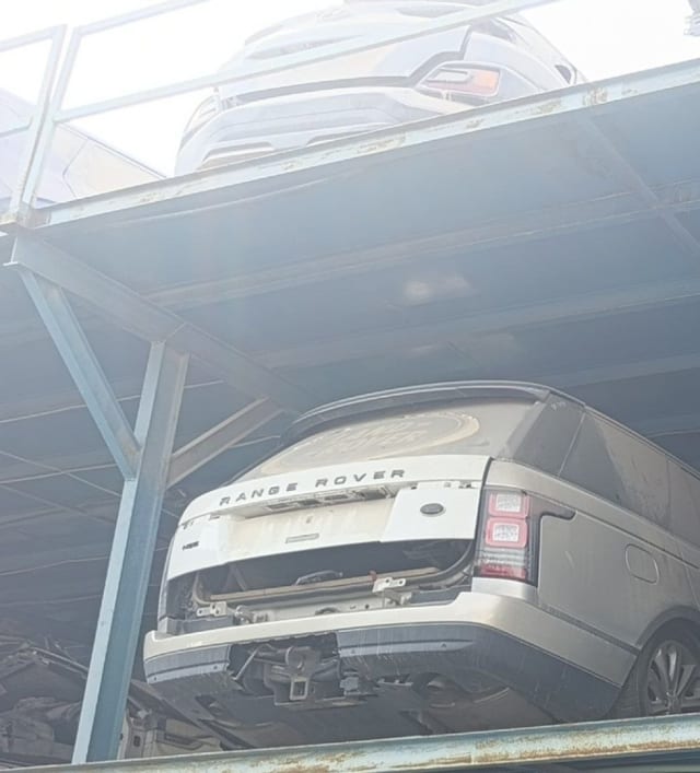 Champagne Land Rover Range Rover car for parts, rear view with tailgate and taillights, Sharjah market