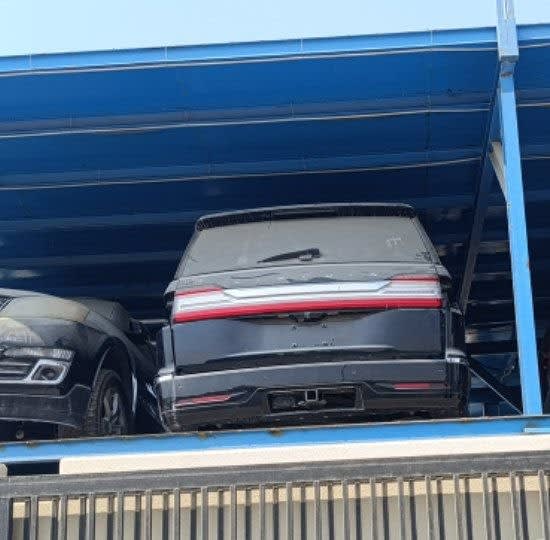 Dark grey Lincoln Navigator SUV for parts — tailgate, LED tail light bar and rear bumper, Sharjah market