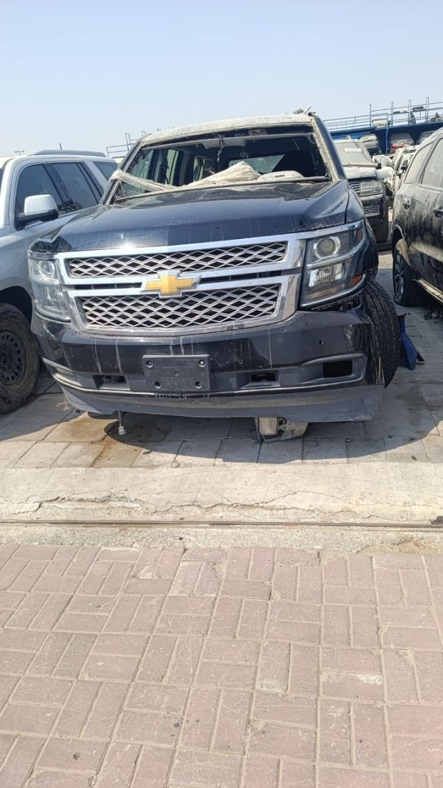 Black Chevrolet Tahoe car for parts: grille, headlights, hood and front bumper, Sharjah market