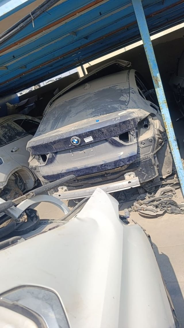 Dark blue BMW X4 rear halfcut, tailgate and bumper reinforcement, Sharjah market