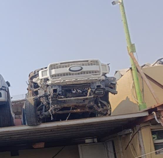 Ford F150 front halfcut on a rooftop: white grille, front suspension and frame, Sharjah market