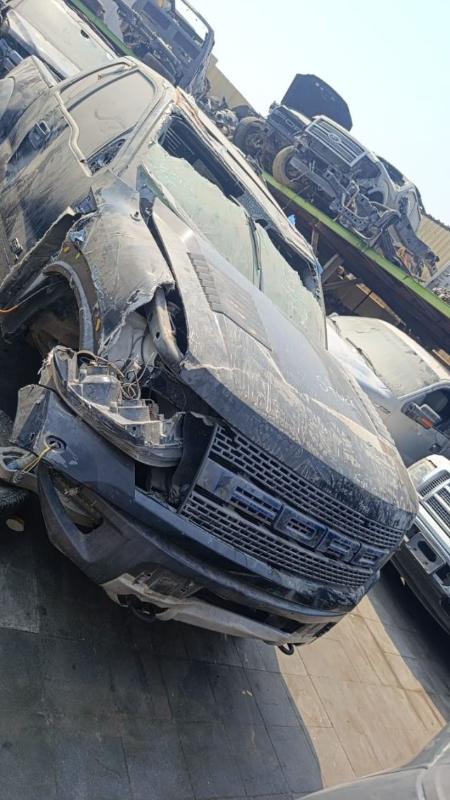 Dark grey Ford F-150 Raptor for parts: FORD grille, front bumper, hood, damaged fender, Sharjah market
