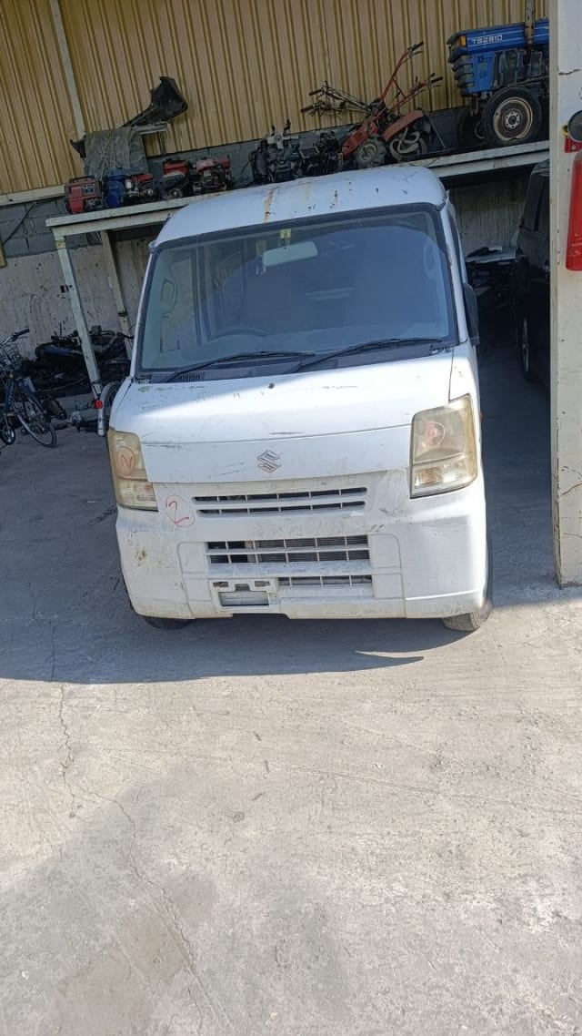 White Suzuki Every van for parts — front bumper, grille, headlights and windshield, Sharjah market