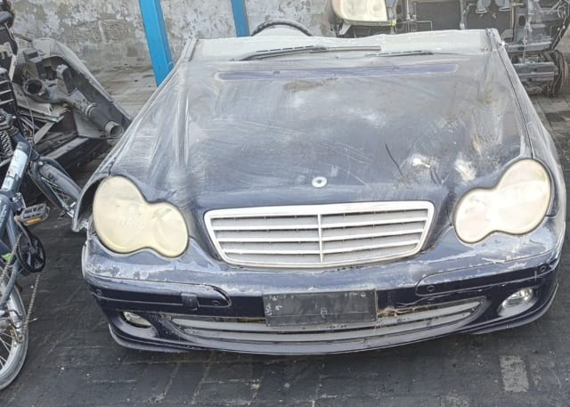 Dark blue Mercedes-Benz C-Class front halfcut with hood, chrome grille, headlights and bumper, Sharjah market