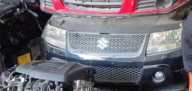 Black Suzuki Grand Vitara front end with grille, headlights, bumper and hood, plus engine, Sharjah market
