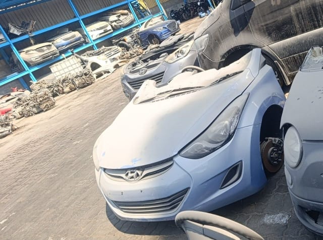 Light blue Hyundai Elantra front halfcut with hood, bumper, grille, headlight and fender, Sharjah market