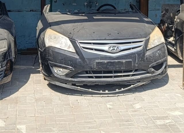Black Hyundai Elantra front halfcut with hood, chrome grille, headlights and bumper, Sharjah market