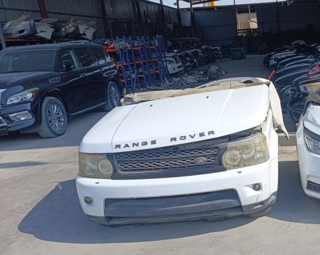 White Range Rover Sport front halfcut with hood, grille, headlights and bumper, Sharjah market