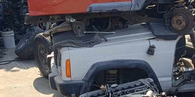 White Jeep Cherokee halfcut, front fender, flare, bumper and coil suspension, Sharjah market