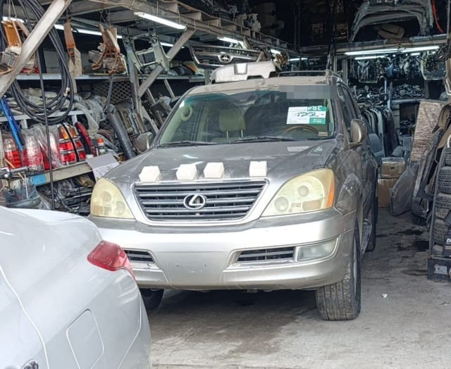 Silver-beige Lexus GX470 SUV for parts: grille, headlights, bumper and hood, Sharjah parts market