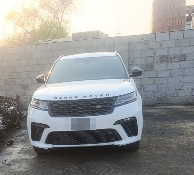 White Range Rover Velar SUV front view — bumper, black grille, headlights and hood, Sharjah parts market