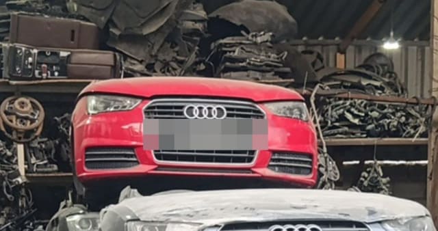 Red Audi A3 hatchback front halfcut with bumper, grille, headlights and hood, Sharjah market