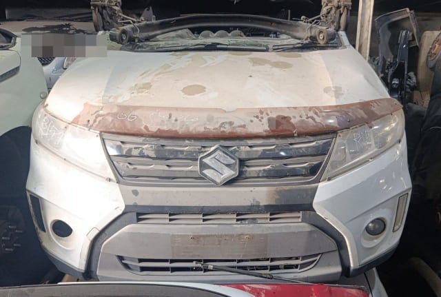 White Suzuki Vitara front halfcut — hood, grille, headlights and bumper, Sharjah market