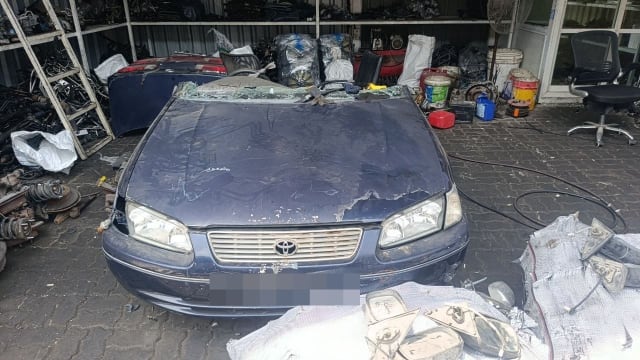 Dark blue Toyota Camry front halfcut with hood, grille, bumper and headlights, Sharjah market