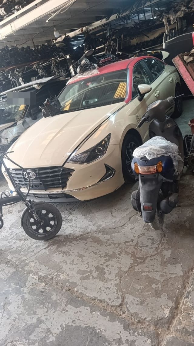 Cream Hyundai Sonata sedan with red roof for parts: front bumper, grille, headlights, Sharjah market