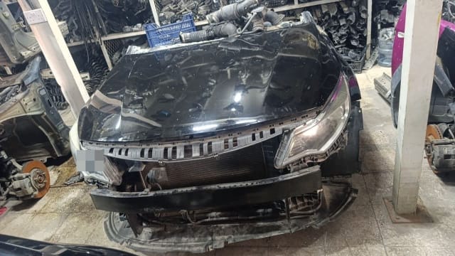 Black Toyota Camry front halfcut with hood, headlight, radiator and bumper bar, Sharjah market