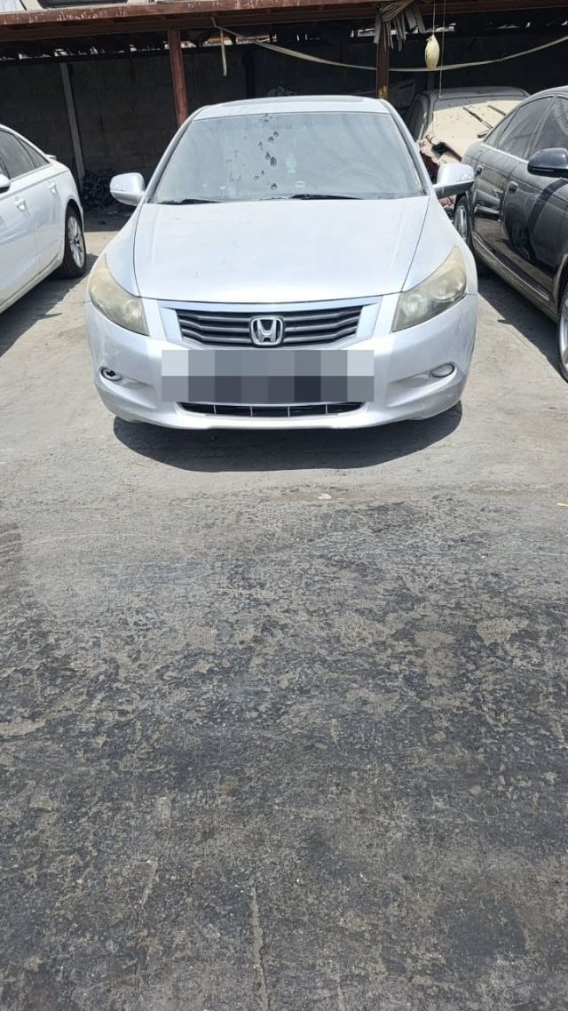 Silver Honda Accord sedan for parts, front view — bumper, grille, headlights and hood, Sharjah market