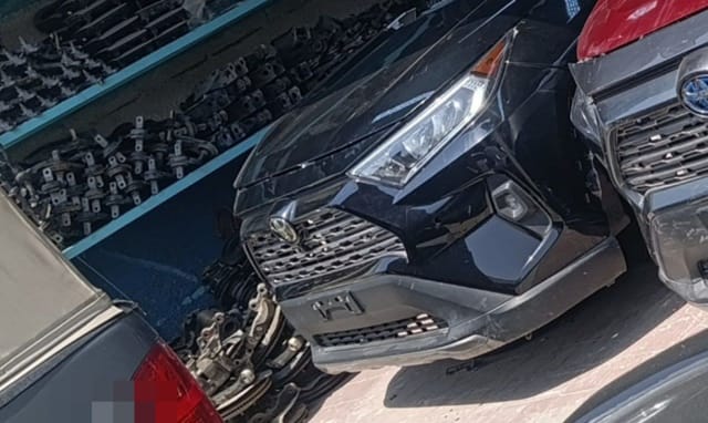 Black Toyota RAV4 front halfcut — bumper, grille, hood and headlight, Sharjah market