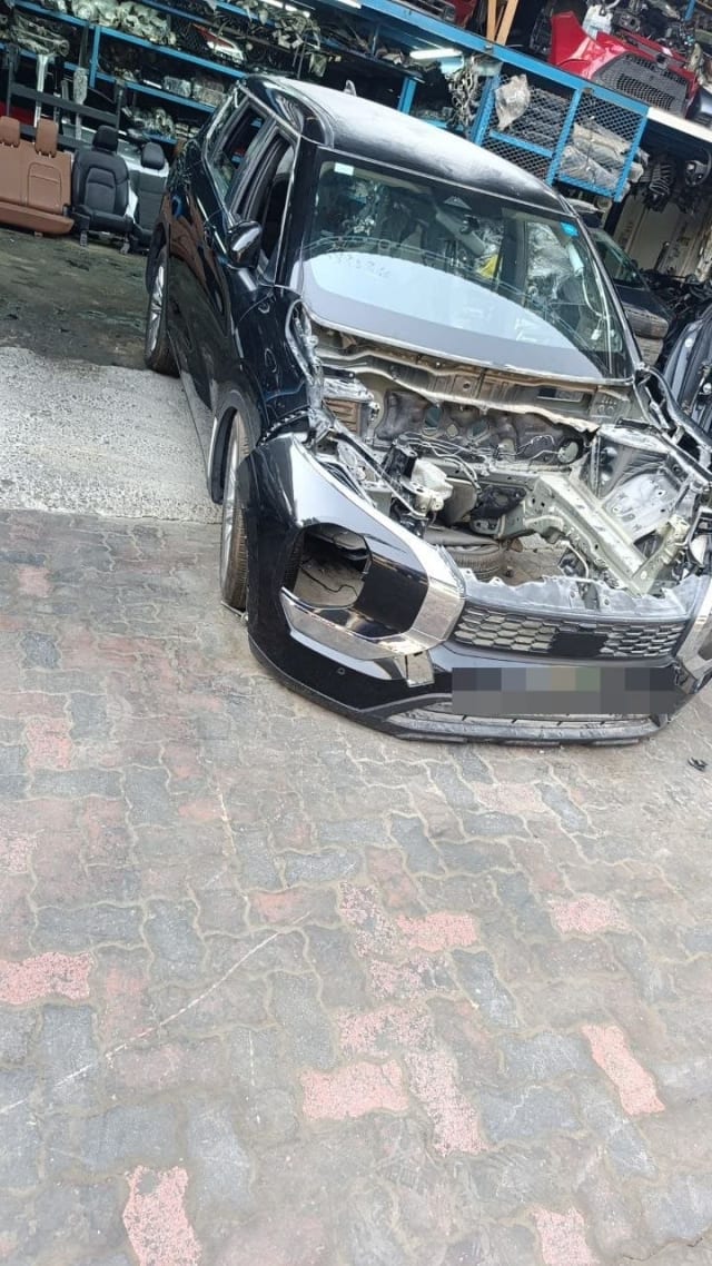 Black MG Hector car for parts with hood and headlights removed, front bumper and grille intact, Sharjah market