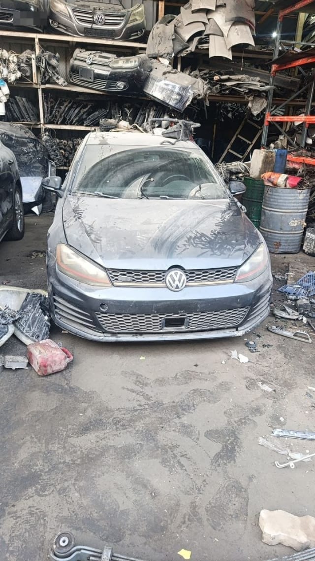Dark grey Volkswagen Golf GTI for parts — front bumper, grille, headlights and hood, Sharjah market