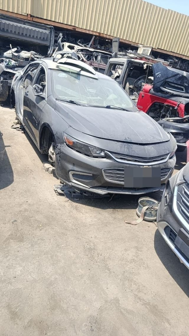 Dark grey Chevrolet Malibu sedan halfcut — bumper, grille, headlights and hood, Sharjah market