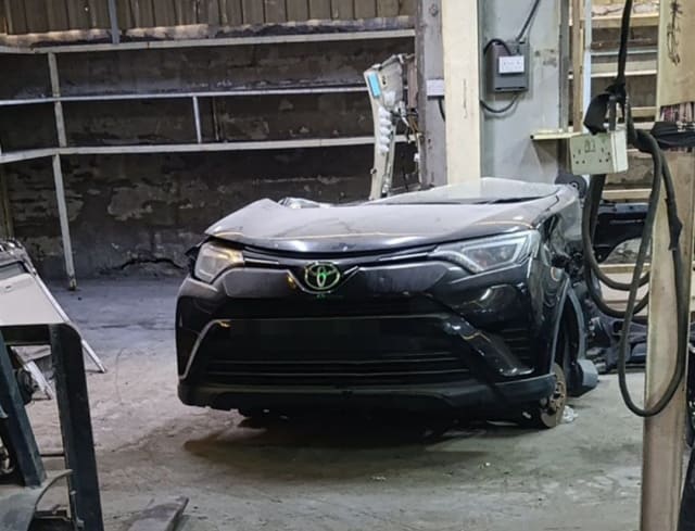 Black Toyota RAV4 front halfcut with hood, bumper, grille and headlights, Sharjah market