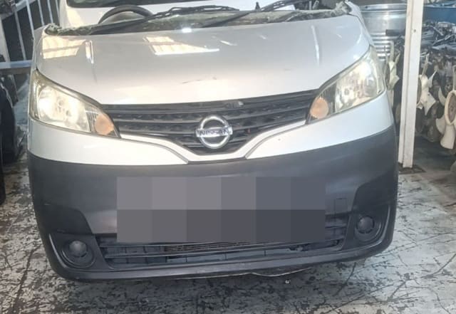 Silver Nissan NV200 van front halfcut with hood, grille, headlights and grey bumper, Sharjah market