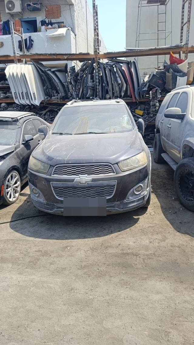 Dark grey Chevrolet Captiva car for parts — front bumper, grille, headlights and hood, Sharjah market