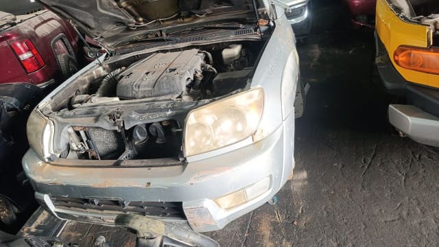 Silver Toyota 4Runner front halfcut, hood open with engine, headlights and front bumper, Sharjah market