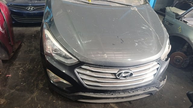 Dark grey Hyundai Santa Fe front halfcut with hood, chrome grille and headlights, Sharjah market