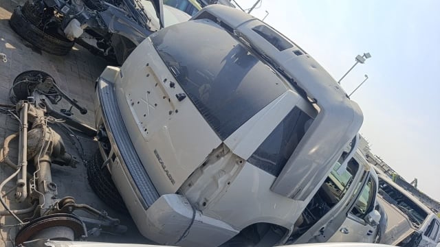 White Cadillac Escalade rear halfcut — tailgate, rear glass and bumper, Sharjah market