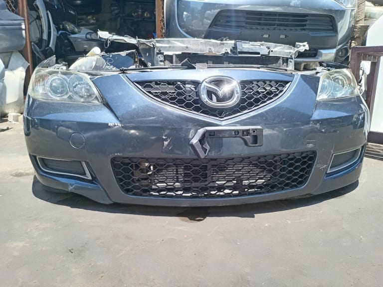 Bumper + Grille Mazda Mazda3