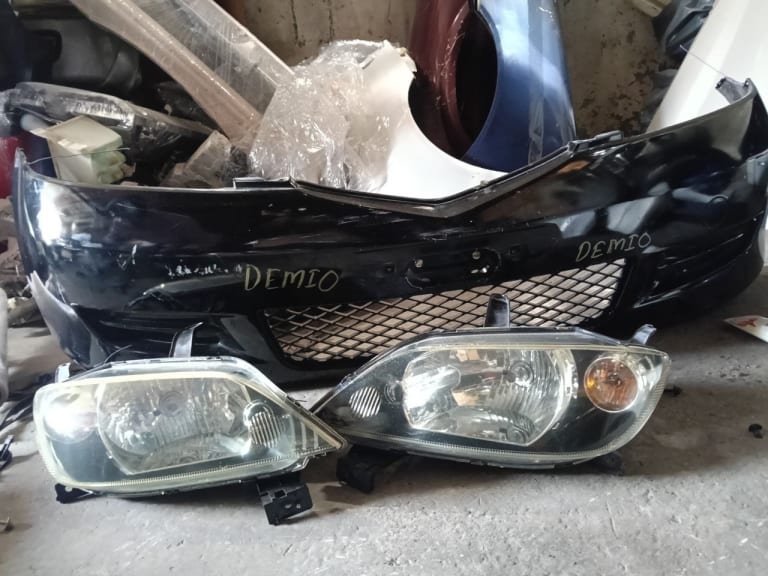 Bumper + Headlights Mazda Demio