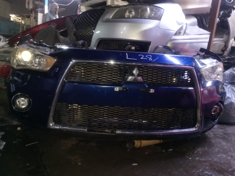 Bumper + Grille Mitsubishi Outlander 6400C433