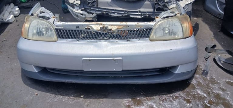 Bumper + Headlights Toyota Platz