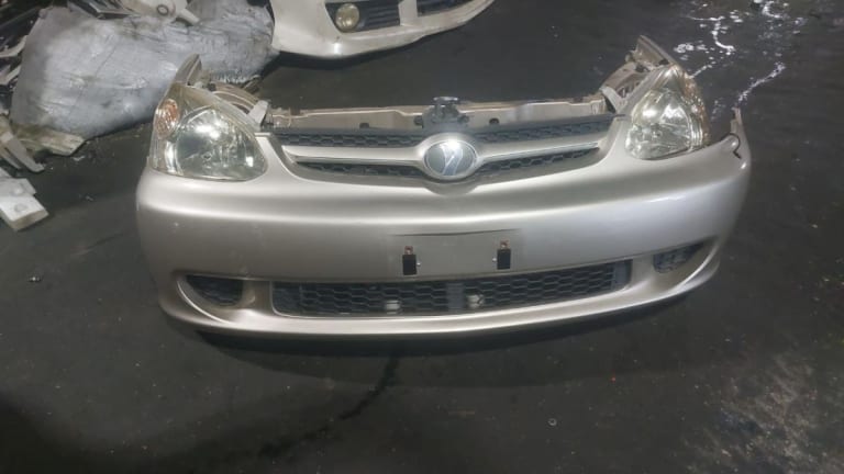 Bumper + Headlights Toyota Platz