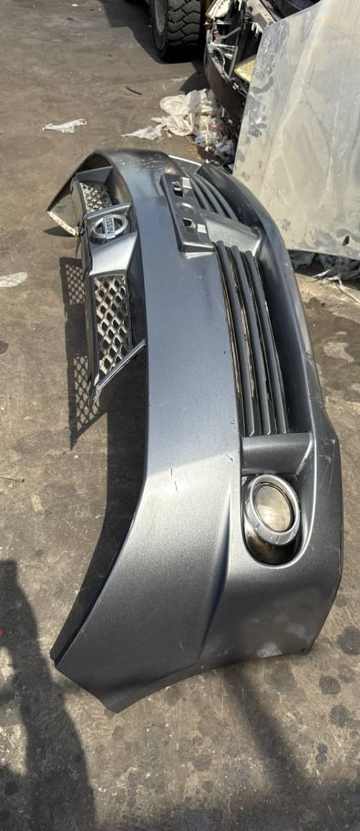 Bumper + Grille Nissan Wingroad