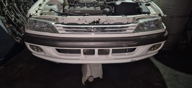 Toyota Carina Фары 2шт,габариты 2шт,решетка,бампер,радиатор,планка 