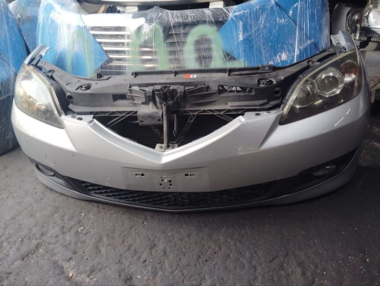 Bumper + Headlights Mazda Mazda3 used in Sharjah — photo 2