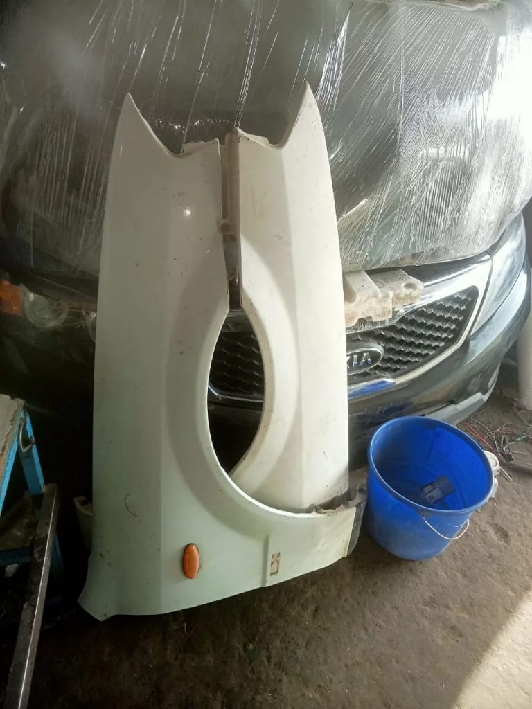 Nose cut + Hood + Fender Mazda Familia used in Sharjah — photo 9