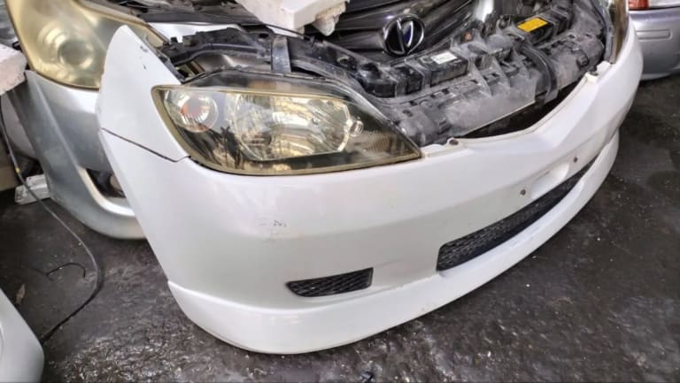 Bumper + Headlights Mazda Demio used in Sharjah — photo 2