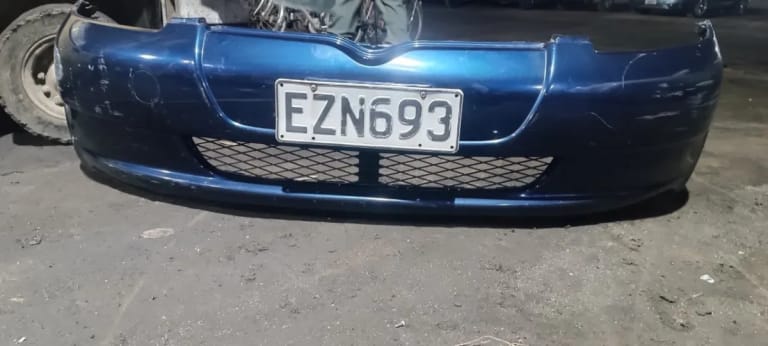 Bumper + Headlights Toyota Vitz
