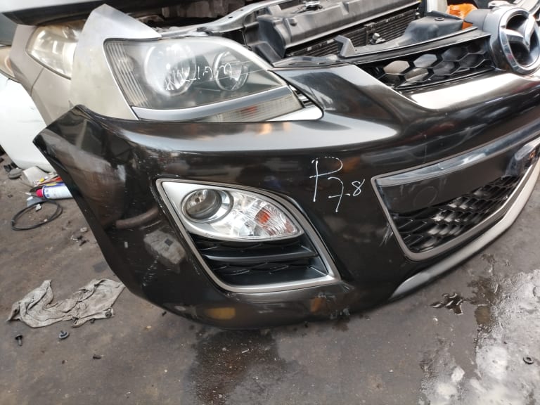 Bumper + Grille + Headlights Mazda CX-7 used in Sharjah — photo 2