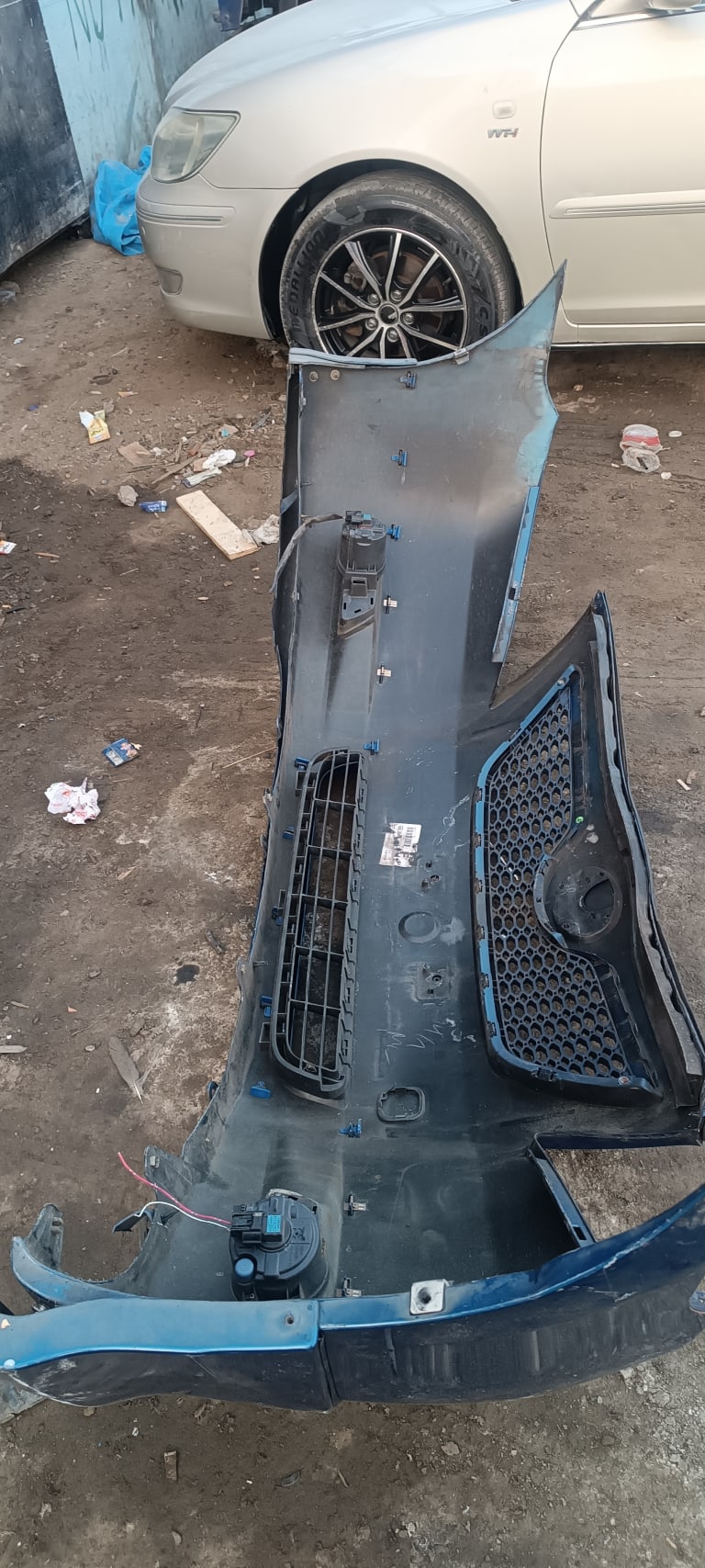 Bumper + Grille Toyota Camry