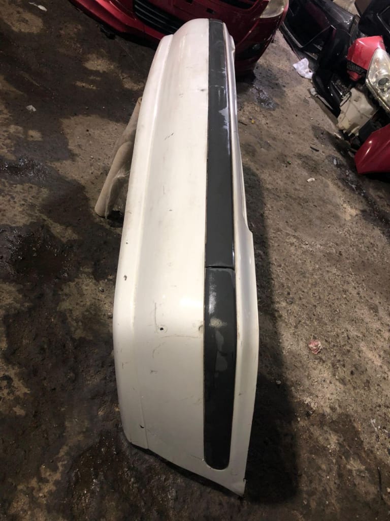 Nissan Sunny Бампер задний 