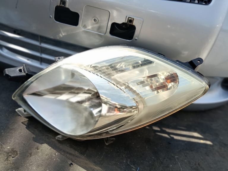 Bumper + Grille + Headlights Toyota Vitz used in Sharjah — photo 11